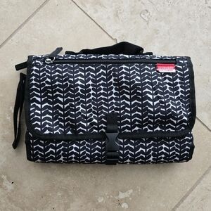 Skidaddle by Skip Hop Portable Diaper Changing Station in the Black Vine Pattern
